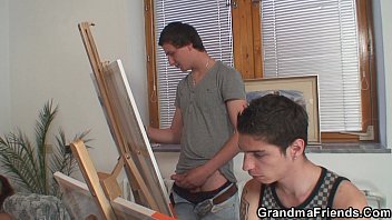 Skinny granny swallows two cocks